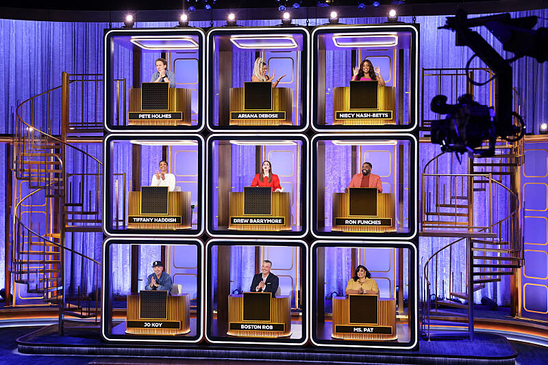 Coverage of the CBS Original Series HOLLYWOOD SQUARES, Season 2, Episode 222, scheduled to air on the CBS Television Network. Pictured: (Clockwise) Pete Holmes, Ariana DeBose, Niecy Nash-Betts, Ron Funches, Ms. Pat, Boston Rob, Jo Koy, Tiffany Haddish and Co-Host Drew Barrymore. Photo: Matthew Taplinger/CBS ©2025 CBS Broadcasting, Inc. All Rights Reserved.