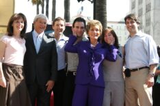 Television reality courtroom star Judge Judy Sheindlin poses with her family as she receives the 2304 star on the Hollywood Walk of Fame, poses with on February 14, 2006 in Hollywood, California.