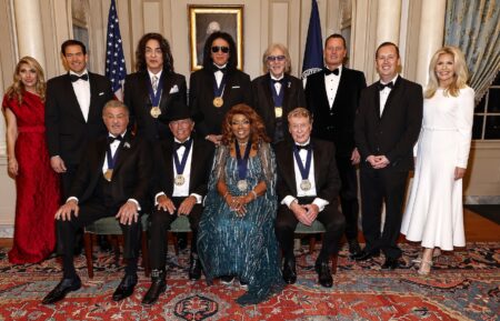 WASHINGTON, DC - DECEMBER 06: (Back Row L-R) Jeanette Dousdebes Rubio, Secretary of State Marco Rubio, Paul Stanley, Gene Simmons, Peter Criss, Amb. Richard Grenell, Kennedy Center President, Amb. Sergio Gor, Amb. Monica Crowley and (Front Row L-R) Sylvester Stallone, George Strait, Gloria Gaynor, Michael Crawford pose for the class photo at the 48th Kennedy Center Honors Medallion Reception at the U.S. Department of State on December 06, 2025 in Washington, DC. (Photo by Paul Morigi/Getty Images)