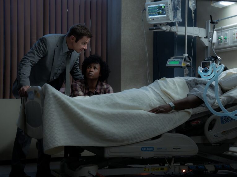 L-R: Jeremy Renner as Mike McLusky, Khalilah Joi as Whitney and Tobi Bamtefa as Deverin "Bunny" Washington in Mayor of Kingstown episode 6, season 4, streaming on Paramount+, 2025. Credit: Dennis P. Mong Jr./Paramount+ ©2025 Viacom International Inc. All Rights Reserved. Mayor of Kingstown and all related titles, logos and characters are trademarks of Viacom International Inc.