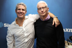 Anderson Cooper (R) poses for a photo with host Andy Cohen during a visit to 'Andy Cohen Live' on SiriusXM's Radio Andy