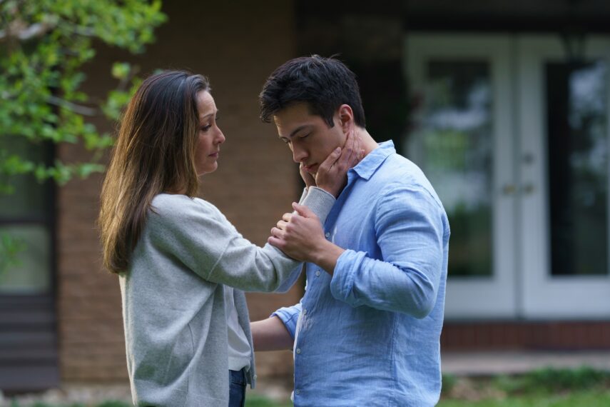 Christina Chang as Yuna Hollander and Hudson Williams as Shane Hollander in the 'Heated Rivalry' Season 1 finale