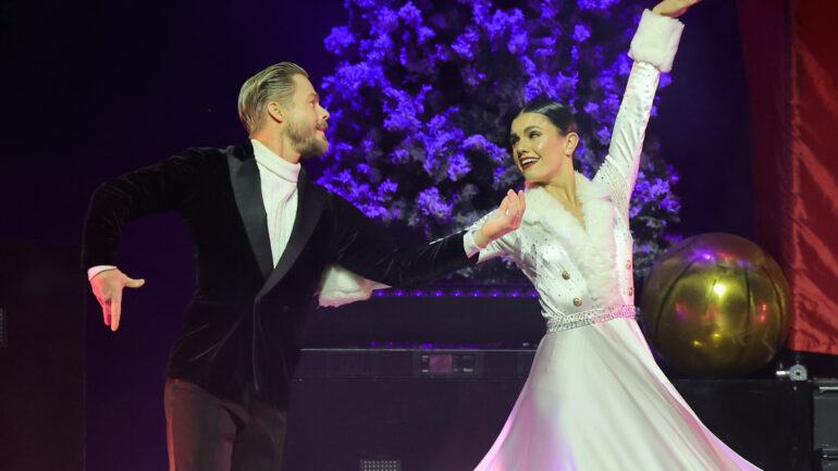 Derek Hough (L) and Hayley Erbert Hough perform during a stop of Derek Hough's "Dance for the Holidays" tour at BleauLive Theater at Fontainebleau Las Vegas