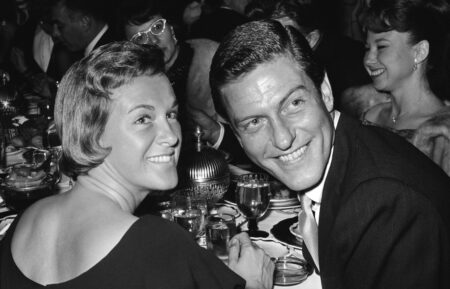 American actor and comedian Dick Van Dyke and his wife, Margie, turning as they sit at their table at the Cocoanut Grove, at the Ambassador Hotel in Los Angeles, California, 1963. The club was hosting Bobby Darin's opening night.