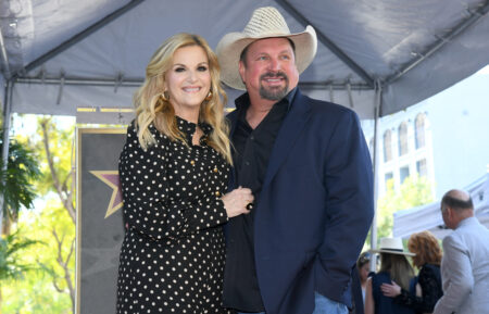 Trisha Yearwood and Garth Brooks pose onstage during the ceremony honoring Trisha Yearwood with a Star on the Hollywood Walk of Fame