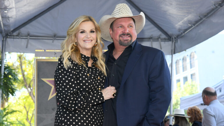 Trisha Yearwood and Garth Brooks pose onstage during the ceremony honoring Trisha Yearwood with a Star on the Hollywood Walk of Fame