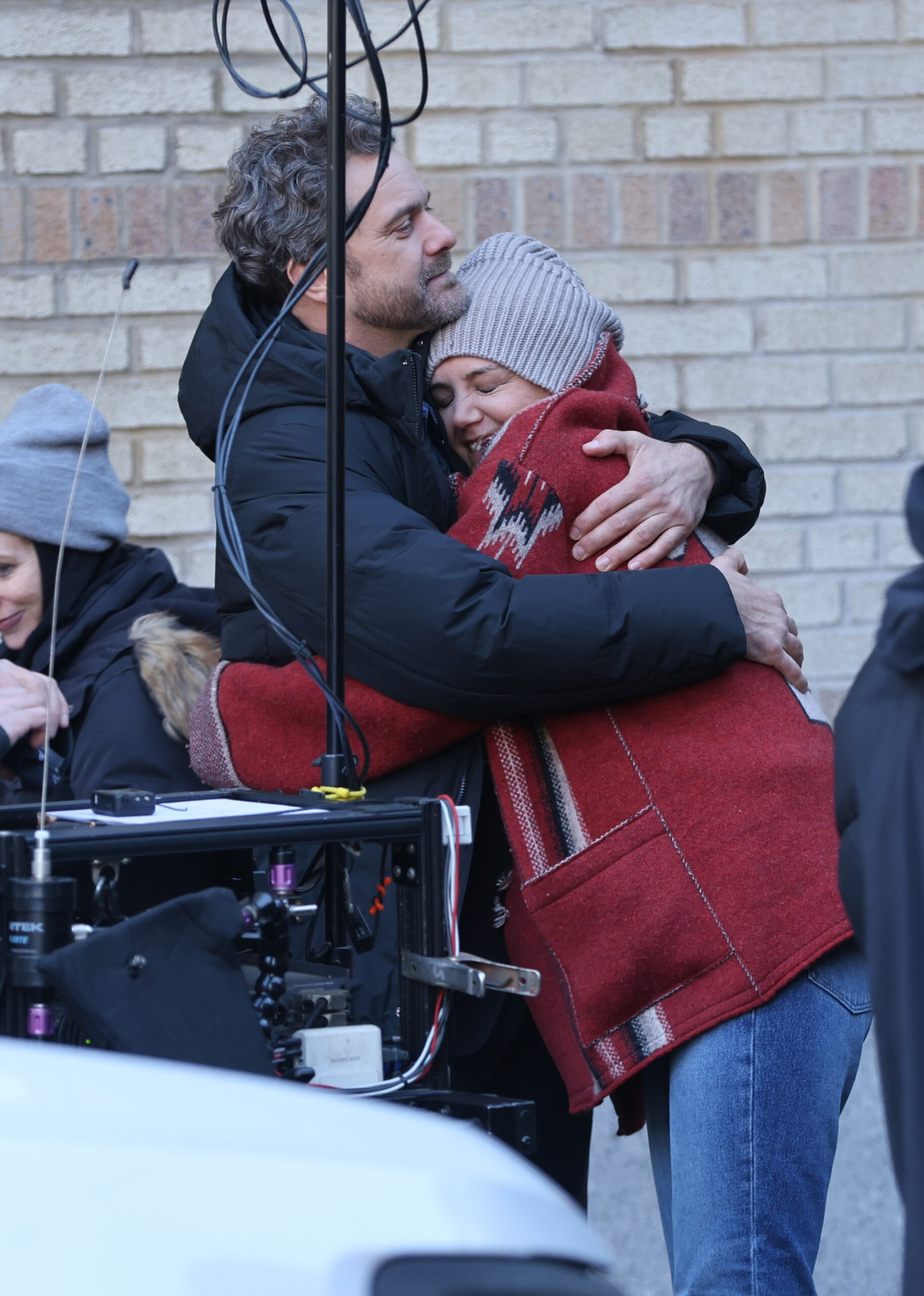 Joshua Jackson and Katie Holmes are seen at the movie set of the 'Happy Hours' in the West Village, Manhattan on December 03, 2025 in New York City.
