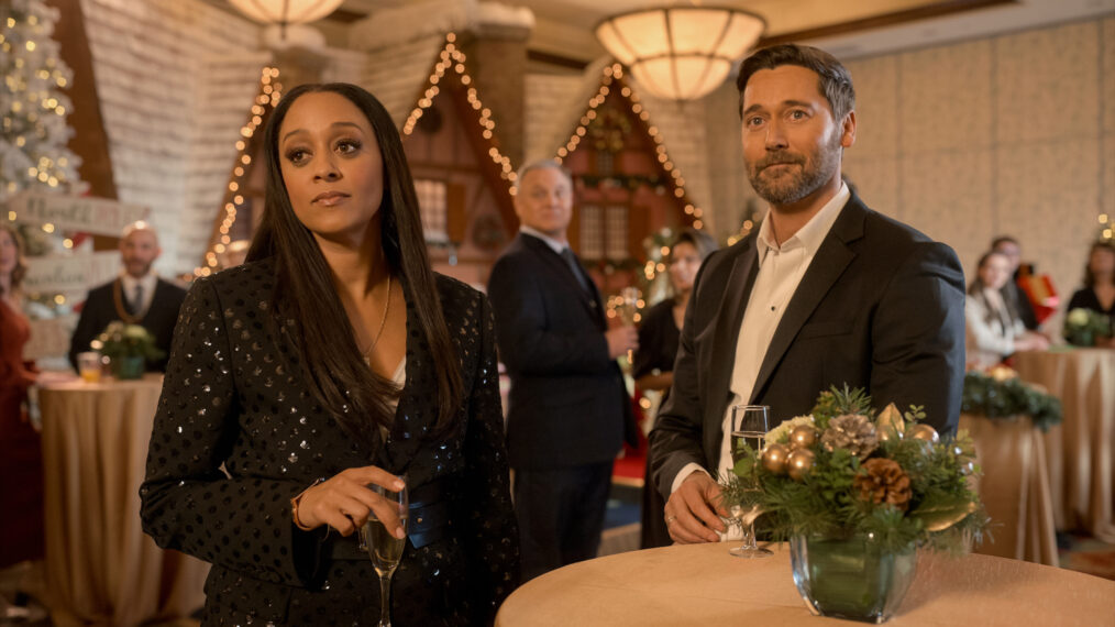 Tia Mowry as Natasha and Ryan Eggold as Matthew in 'My Secret Santa'