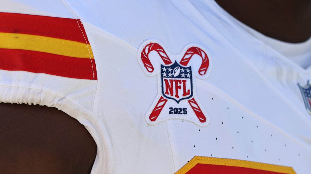 A detail view of the NFL logo with holiday candy canes on the jersey of a Kansas City Chiefs player during warm ups prior to the game against the Tennessee Titans at Nissan Stadium on December 21, 2025 in Nashville, Tennessee.