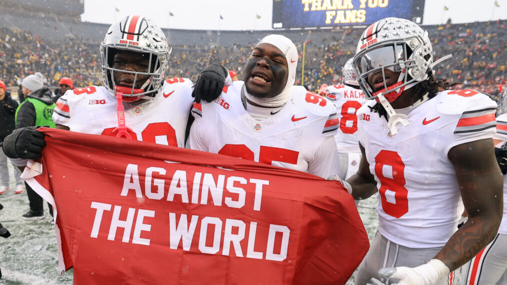 Ohio State Buckeyes players celebrate after a 27-9 victory against the Michigan Wolverines at Michigan Stadium on November 29, 2025 in Ann Arbor, Michigan.