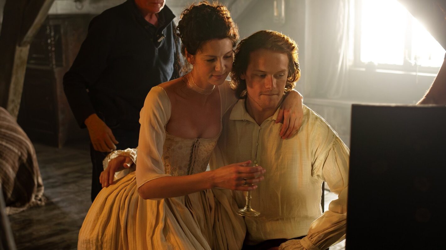 Sam Heughan and Caitriona Balfe behind the scenes of 'Outlander's Season 1 episode 'The Wedding'
