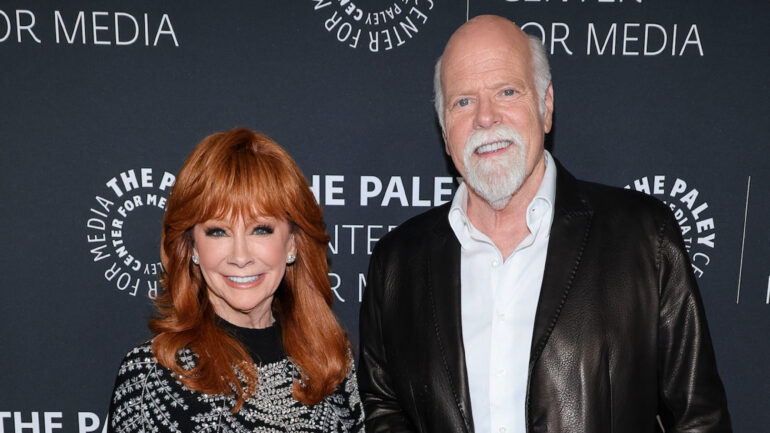 Reba McEntire and Rex Linn arrive during the annual Paley Honors Fall Gala at The Beverly Hilton on November 10, 2025 in Beverly Hills, California.
