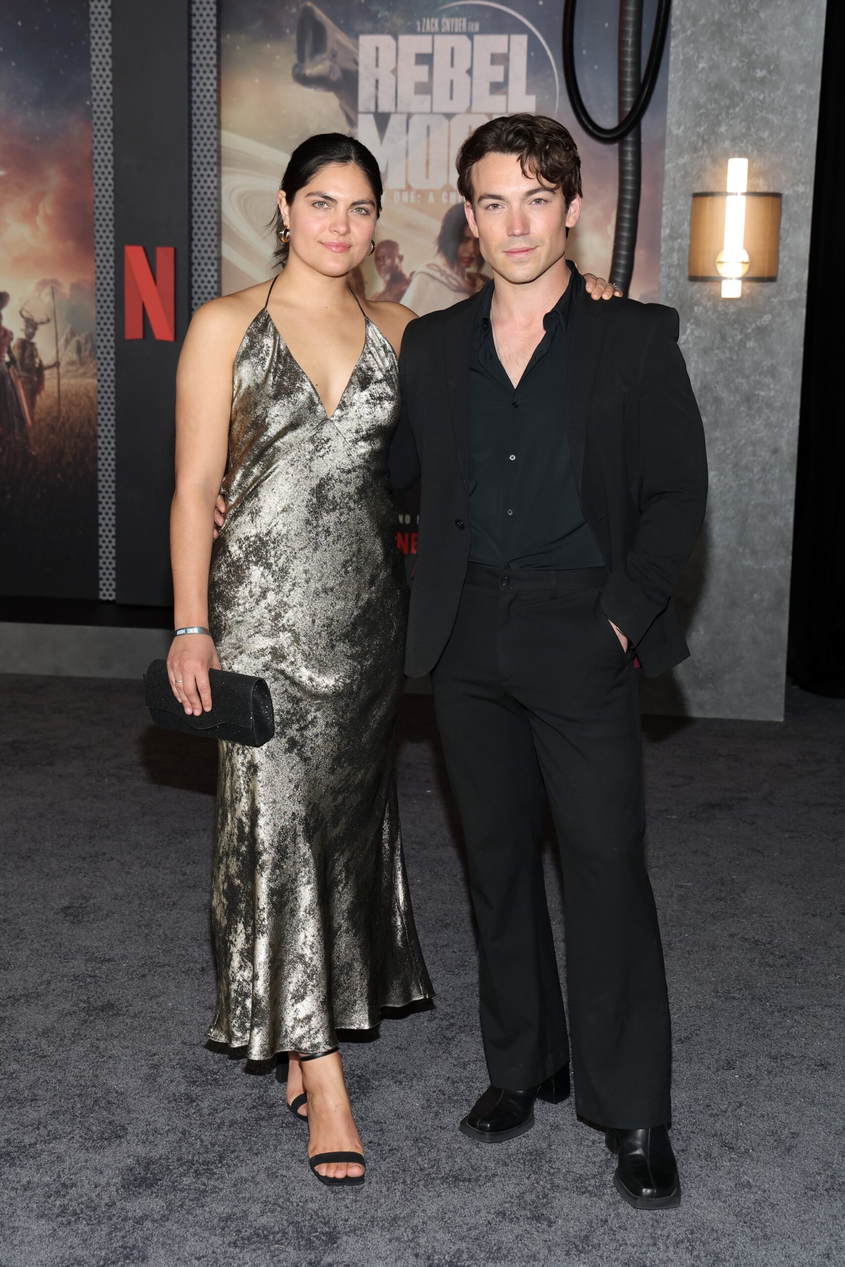 Alicia Ruelas and Rory Gibson attend the Netflix Premiere of Zack Snyder's REBEL MOON - Part One: A Child of Fire at TCL Chinese Theatre on December 13, 2023 in Hollywood, California.