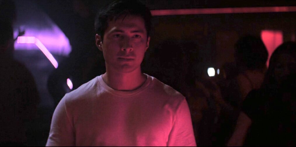 Shane (Hudson Williams) watches Ilya at the club in 'Heated Rivalry' Episode 4