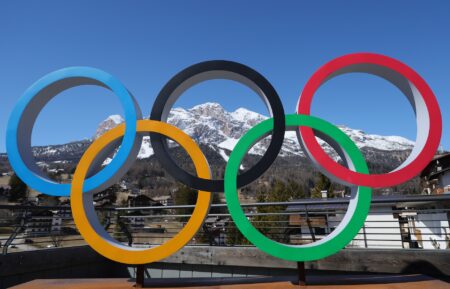 A general view of the Olympic rings in front of the Olympia delle Tofane ski run on March 19, 2025 in Cortina d'Ampezzo, Italy.