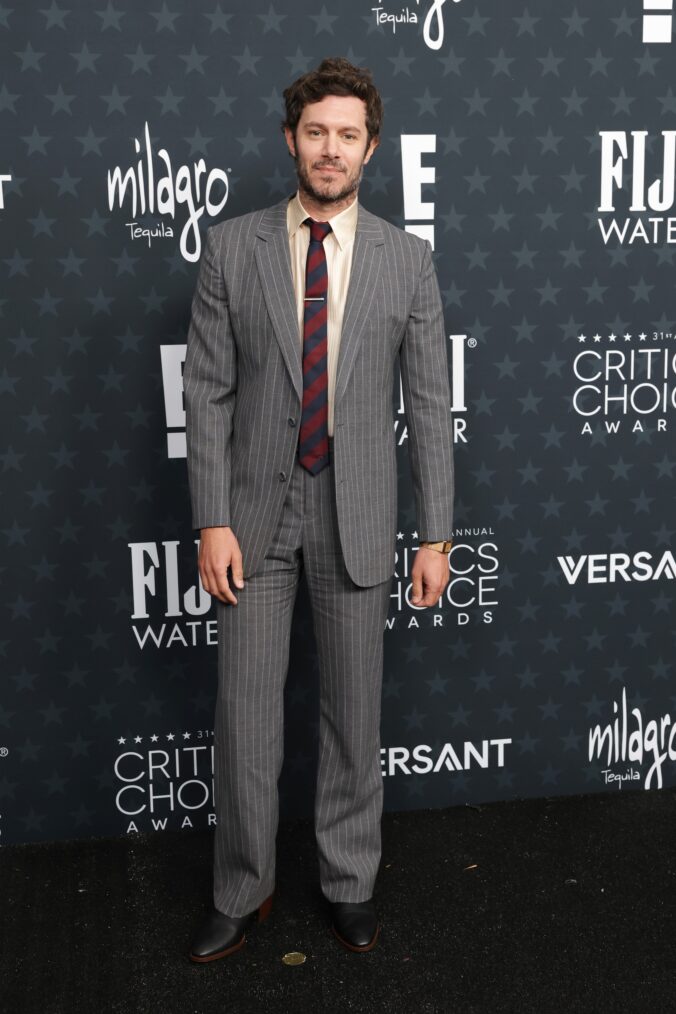 Adam Brody attends the 31st Annual Critics Choice Awards at Barker Hangar on January 04, 2026 in Santa Monica, California.