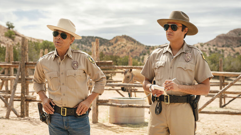 Zahn McClarnon as Joe Leaphorn and Kiowa Gordon as Jim Chee - Dark Winds _ Season 4, Episode 1