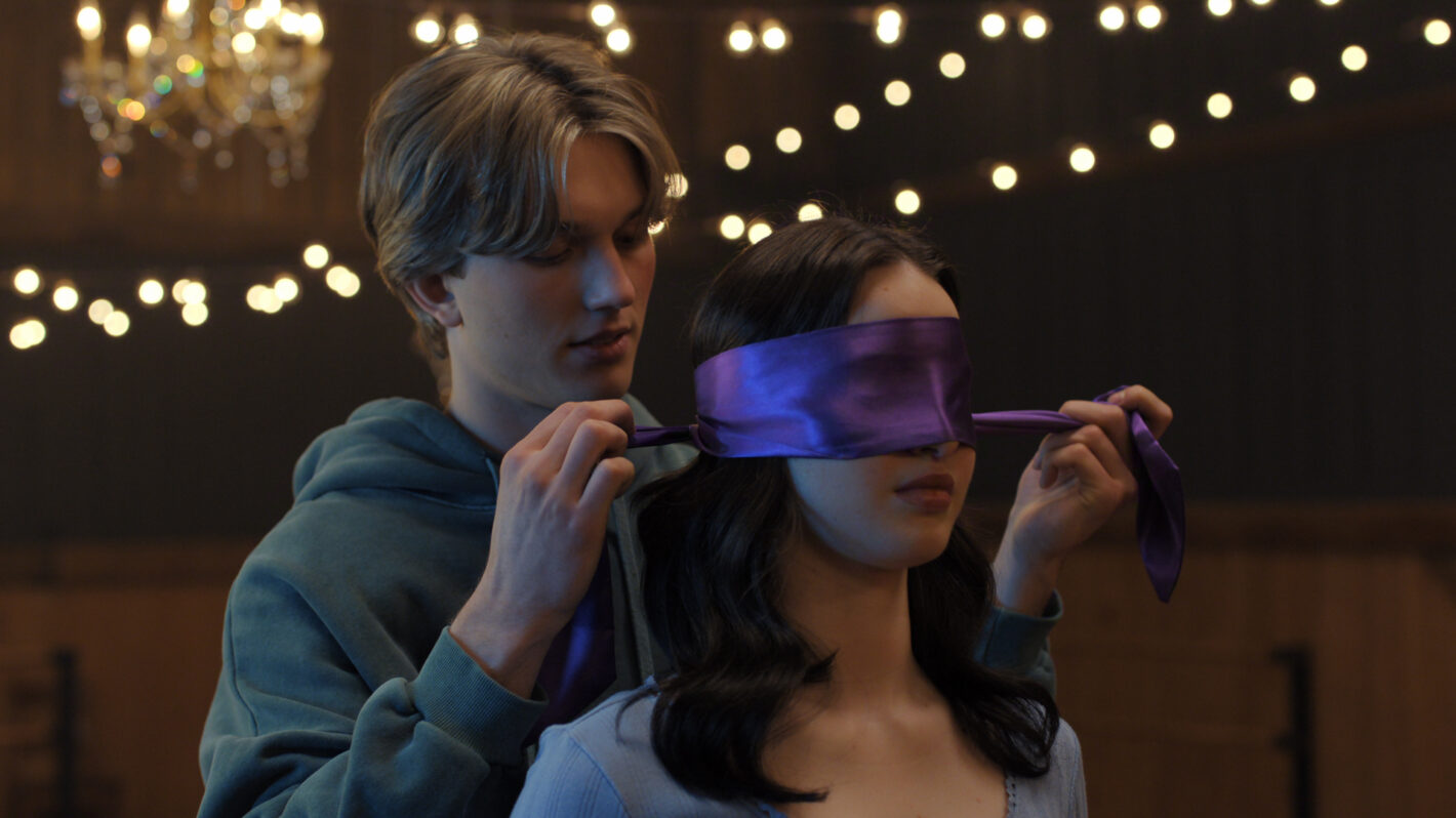 Cale Ambrozic as Brayden Elliot and Madelyn Keys as Adriana Russo in Finding Her Edge