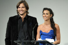 Actors Ashton Kutcher (L) and Demi Moore speak onstage at the 13th Annual Costume Designers Guild Awards with presenting sponsor Lacoste