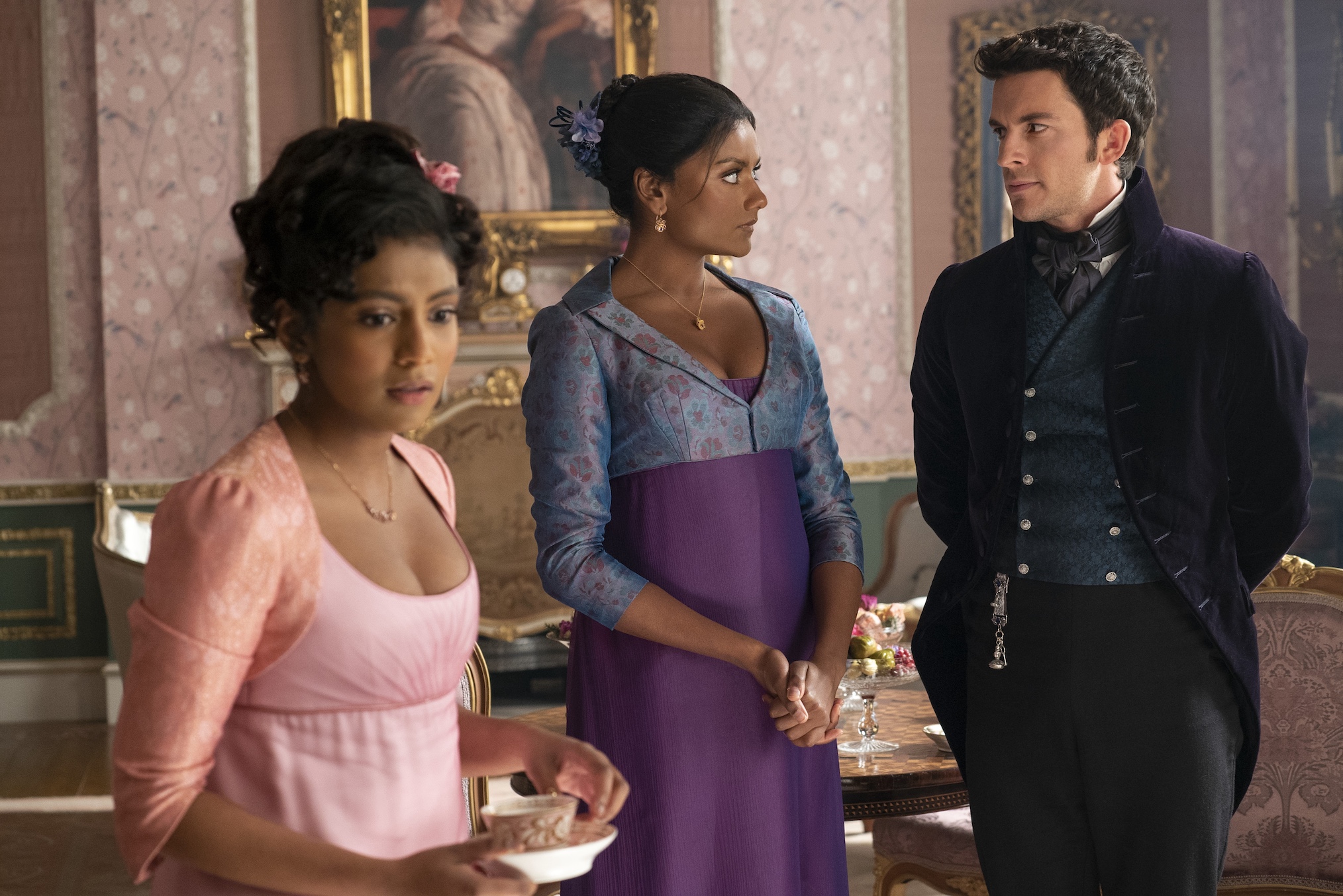Charithra Chandran as Edwina Sharma, Simone Ashley as Kate Sharma, Jonathan Bailey as Anthony Bridgerton in episode 207 of Bridgerton.