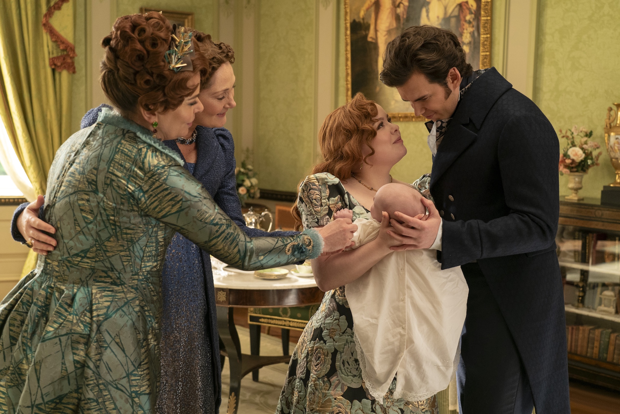 Polly Walker as Lady Portia Featherington, Ruth Gemmell as Lady Violet Bridgerton, Nicola Coughlan as Penelope Featherington, Luke Newton as Colin Bridgerton in episode 308 of Bridgerton