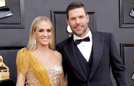 Carrie Underwood and Mike Fisher attend the 64th Annual GRAMMY Awards at MGM Grand Garden Arena on April 03, 2022 in Las Vegas, Nevada