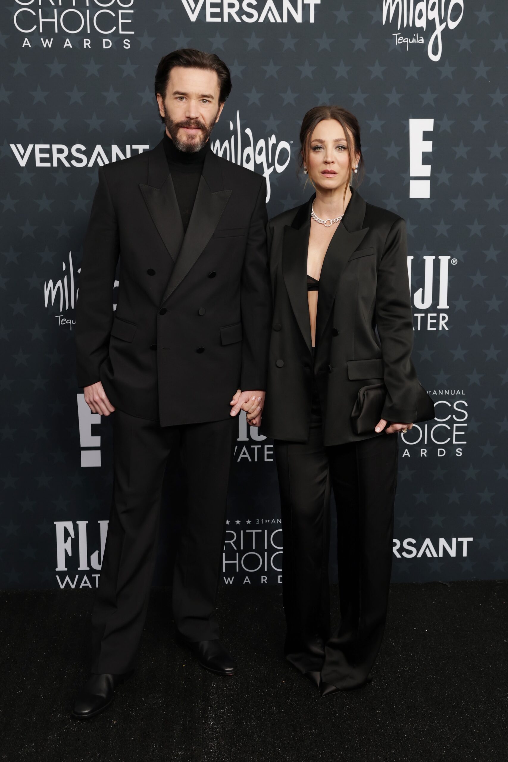 Tom Pelphrey and Kaley Cuoco attend the 31st Annual Critics Choice Awards at Barker Hangar on January 04, 2026 in Santa Monica, California.