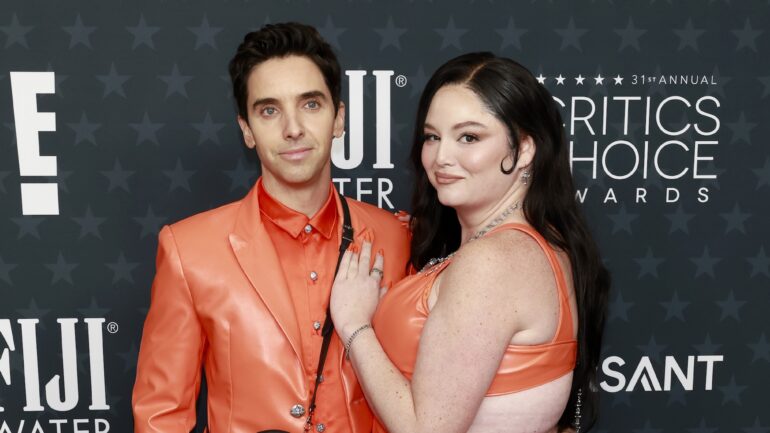 Paul W. Downs and Megan Stalter attend the 31st Annual Critics Choice Awards at Barker Hangar on January 04, 2026 in Santa Monica, California.