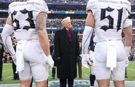 President Donald Trump participates in the coin toss before the 126th Army-Navy Game between the Army Black Knights and the Navy Midshipmen at M&T Bank Stadium on December 13, 2025, in Baltimore, Maryland