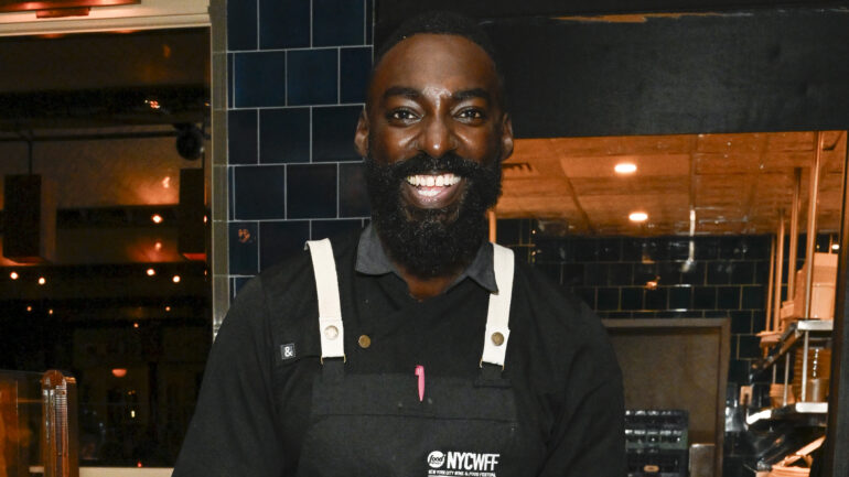 Chef Eric Adjepong poses during the Food Network New York City Wine & Food Festival Dinner