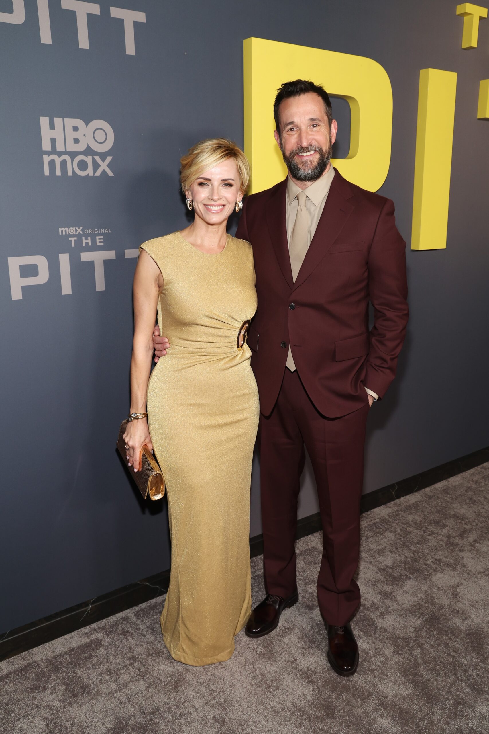 Sara Wells and Noah Wyle attend the Los Angeles Red Carpet Premiere of Max Original Drama Series THE PITT at DGA Theater Complex on January 07, 2026 in Los Angeles, California.