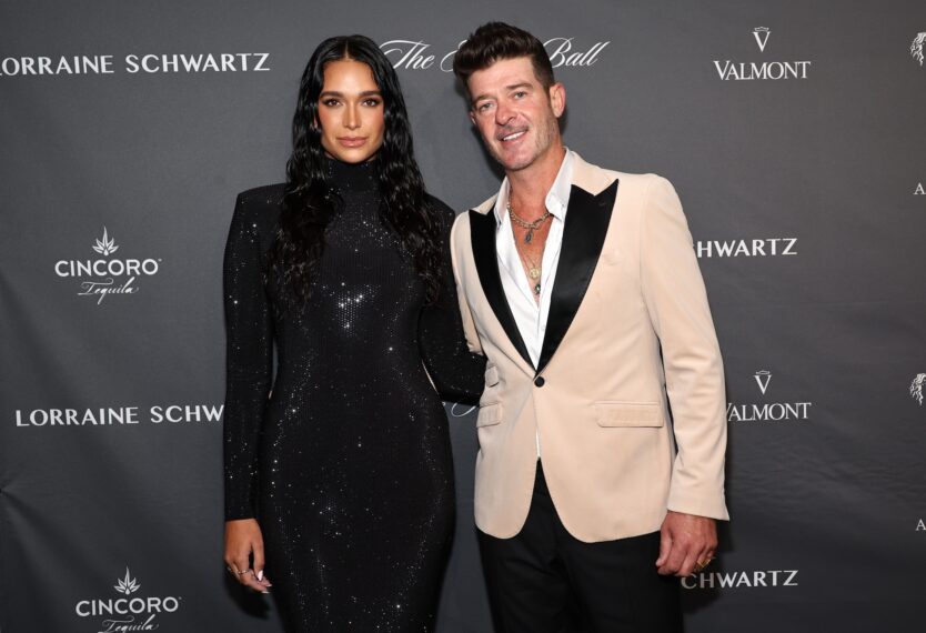 April Love Geary and Robin Thicke attend Angel Ball 2023 hosted by Gabrielle's Angel Foundation at Cipriani Wall Street on October 23, 2023 in New York City.