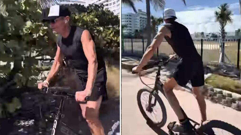 Ryan Seacrest riding a bike with no seat