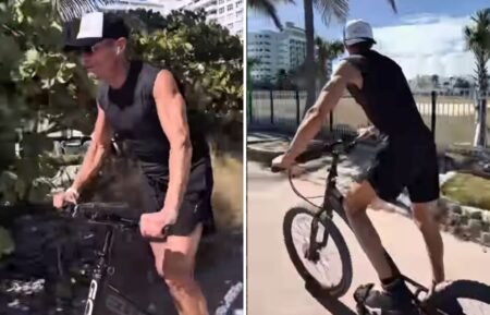 Ryan Seacrest riding a bike with no seat