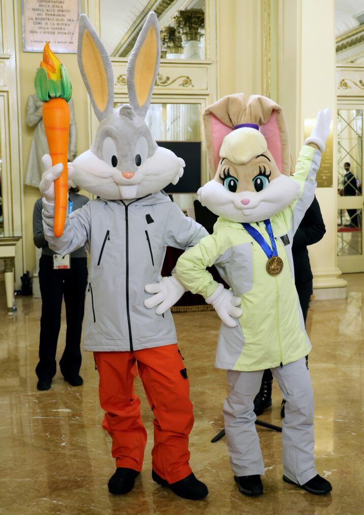 MILAN, ITALY - FEBRUARY 06: Bugs Bunny and Lola Bunny, cartoon characters, arrive on the Red Carpet as they attend the Opening Ceremony during the Milano Cortina 2026 Winter Olympics at Teatro Alla Scala on February 06, 2026 in Milan, Italy. (Photo by Vittorio Zunino Celotto/Getty Images)