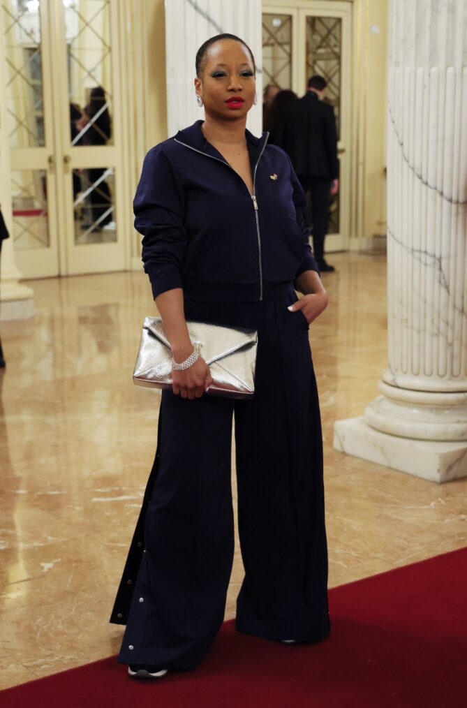 MILAN, ITALY - FEBRUARY 06: Monique Coleman, American actress and dancer, arrives on the Red Carpet as they attend the Opening Ceremony during the Milano Cortina 2026 Winter Olympics at Teatro Alla Scala on February 06, 2026 in Milan, Italy. (Photo by Vittorio Zunino Celotto/Getty Images)