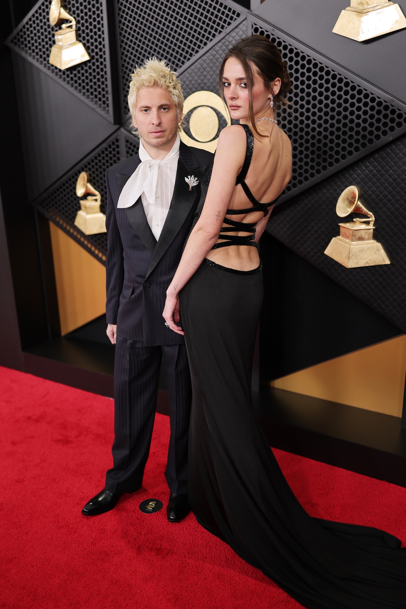 Andrew Watt and Charlotte Lawrence attend the 68th GRAMMY Awards on February 01, 2026 in Los Angeles, California.