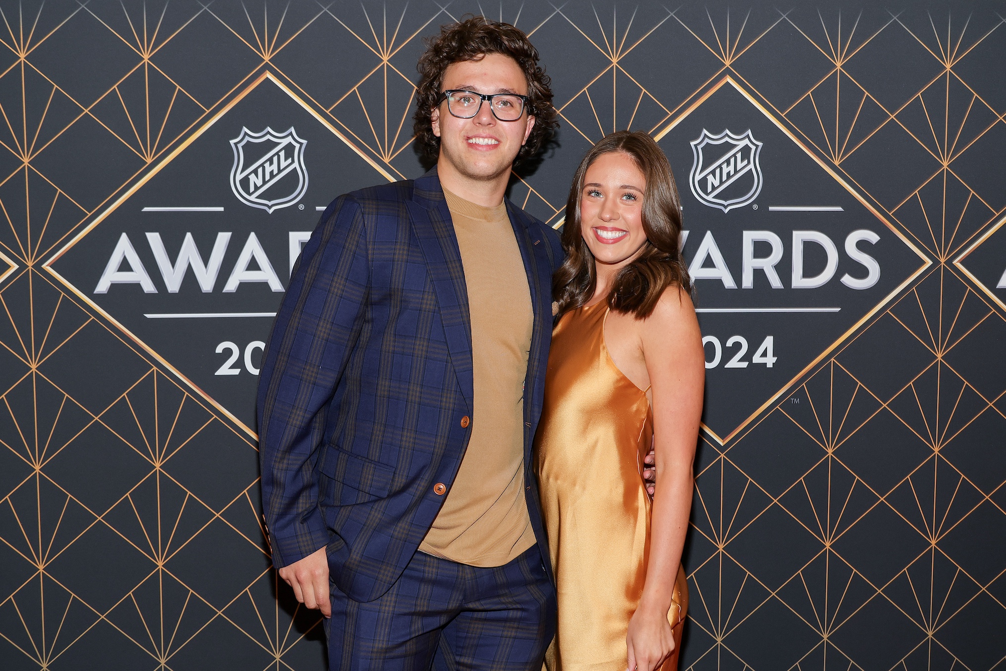 Brock Faber (L) of the Minnesota Wild and Morgan Bosacker attend the 2024 NHL Awards at BleauLive Theater at Fontainebleau Las Vegas on June 27, 2024 in Las Vegas, Nevada.