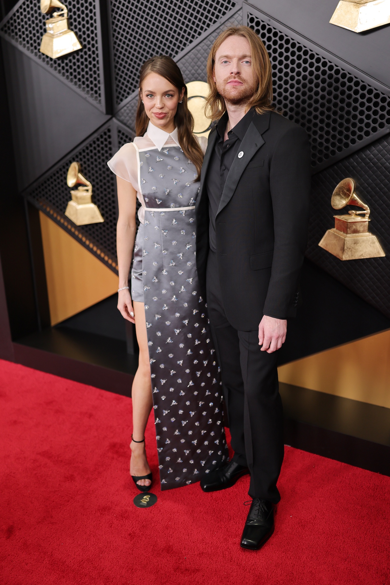 Claudia Sulewski and Finneas O'Connell attend the 68th GRAMMY Awards on February 01, 2026 in Los Angeles, California.
