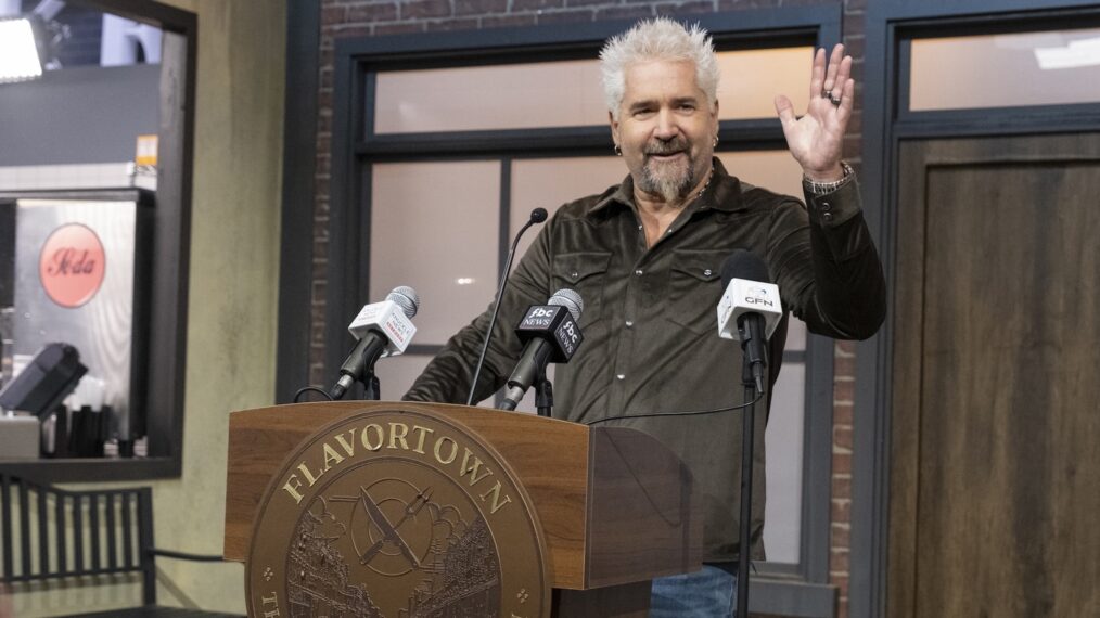 Guy Fieri at the mayor's podium in 'Flavortown Food Fight,' Season 1, Food Network, 2026.