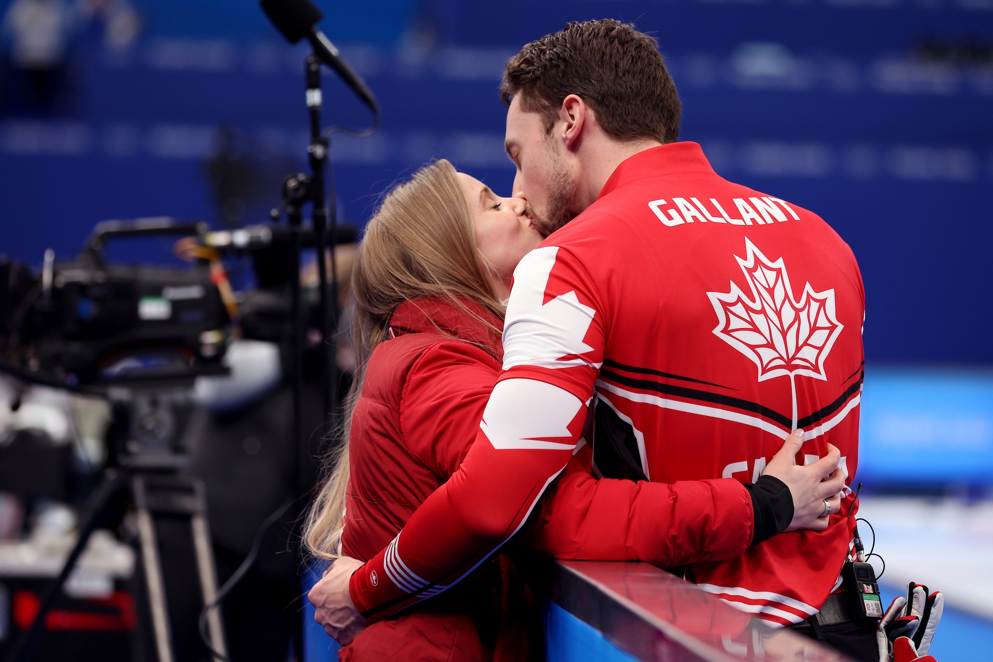 Brett Gallant of Team Canada (R) is congratulated by his partner Jocelyn Peterman on their victory against Team United States during the Men's Curling Bronze Medal Game on Day 14 of the Beijing 2022 Winter Olympic Games at National Aquatics Centre on February 18, 2022 in Beijing, China
