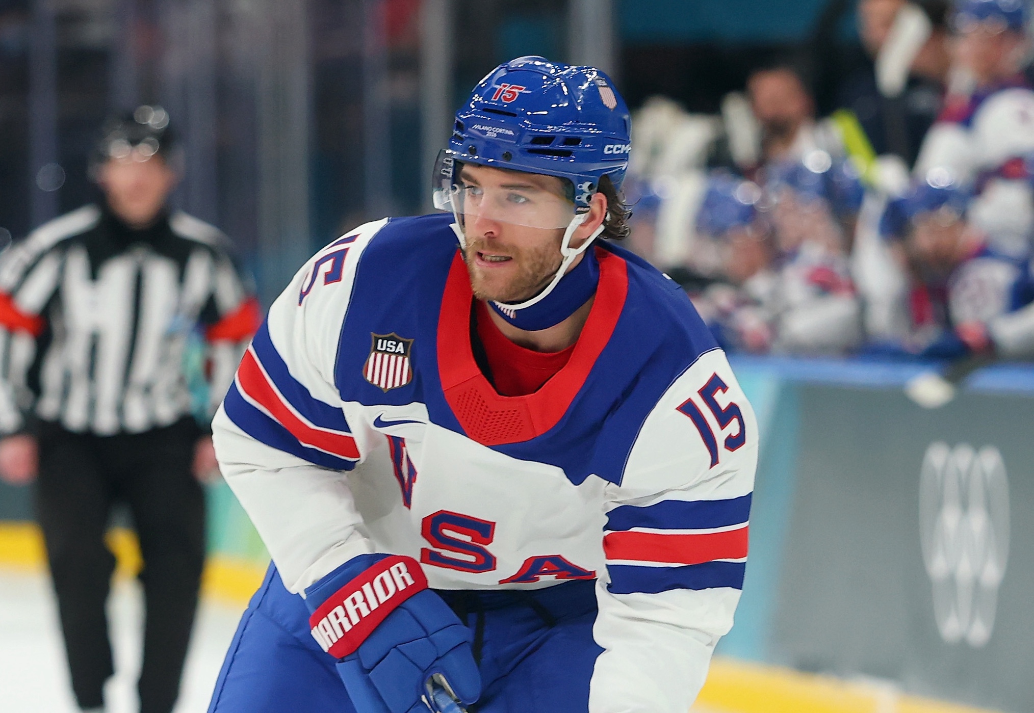 Noah Hanifin #15 of Team United States skates with the puck in the third period during the Men's Preliminary Group C match between Latvia and United States on day six of the Milano Cortina 2026 Winter Olympic games at Milano Santagiulia Ice Hockey Arena on February 12, 2026 in Milan, Italy.