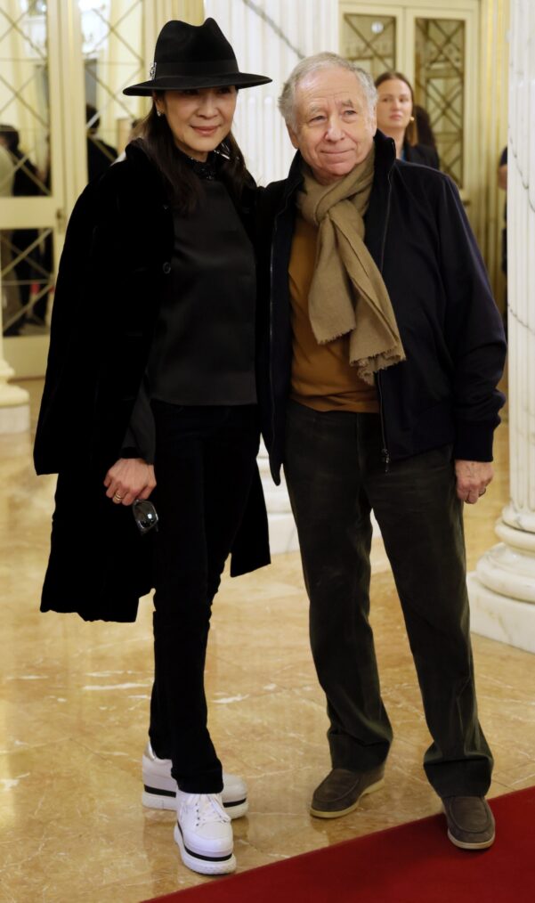 MILAN, ITALY - FEBRUARY 06: Michelle Yeoh, Malaysian actress, and partner Jean Todt, former FIA President and Ferrari Formula One team principal, arrive on the Red Carpet as they attend the Opening Ceremony during the Milano Cortina 2026 Winter Olympics at Teatro Alla Scala on February 06, 2026 in Milan, Italy. (Photo by Vittorio Zunino Celotto/Getty Images)