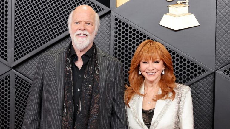 Rex Linn and Reba McEntire attend the 68th GRAMMY Awards at Crypto.com Arena on February 01, 2026 in Los Angeles, California.