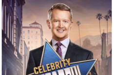 'Celebrity Jeopardy!' host Ken Jennings holding the sign for Season 4
