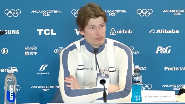 Sturla Holm Lægreid at a 2026 Winter Olympics press conference, February 10, 2026.