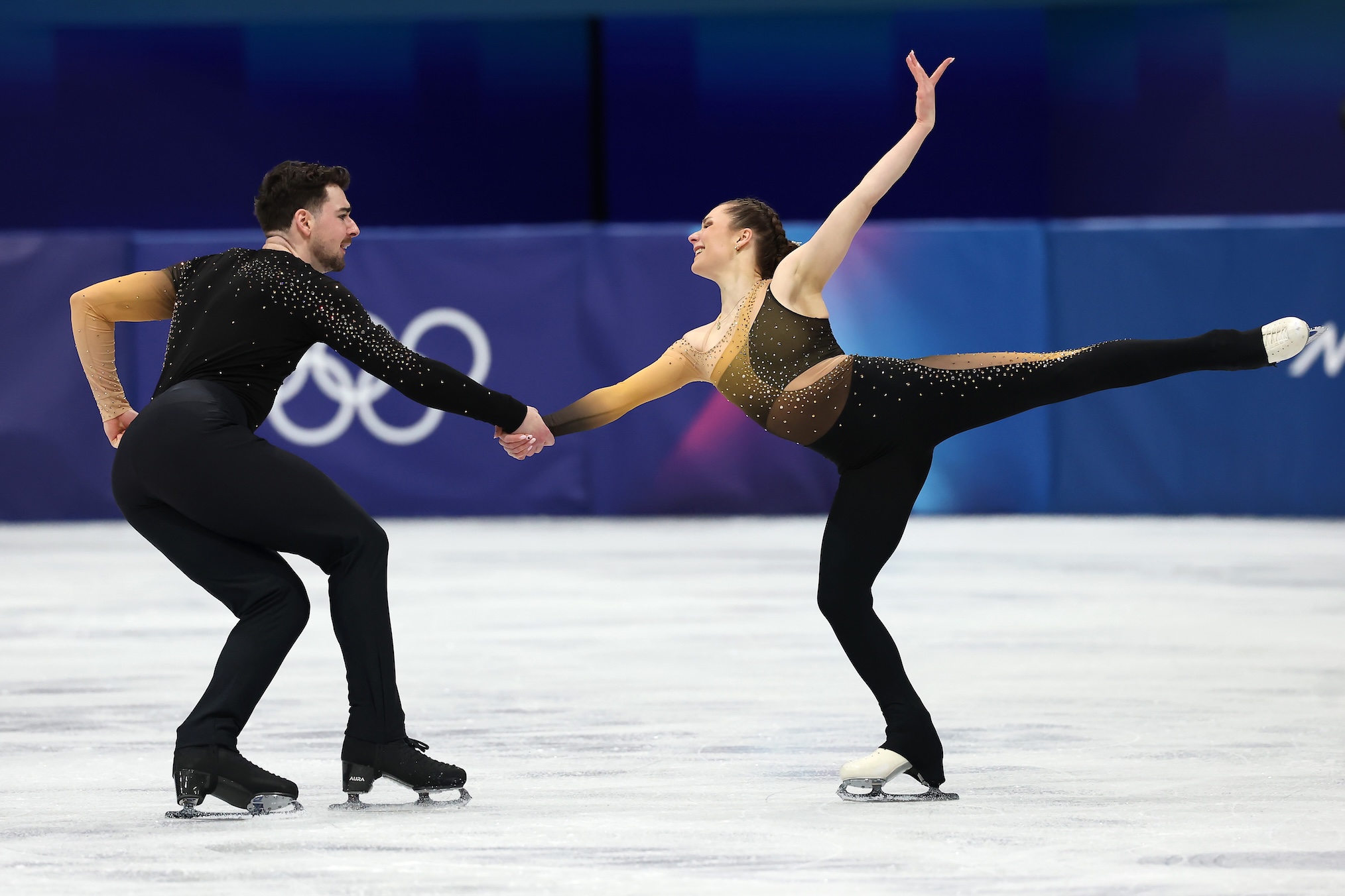 Annika Hocke and partner Robert Kunkel of Team Germany compete in Pair Skating - Short Program on day nine of the Milano Cortina 2026 Winter Olympic games at Milano Ice Skating Arena on February 15, 2026 in Milan, Italy.