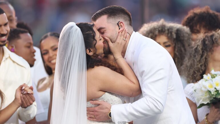 A couple marries during the Bad Bunny performance onstage at the Apple Music Super Bowl LX Halftime Show at Levi's Stadium on February 08, 2026 in Santa Clara, California.