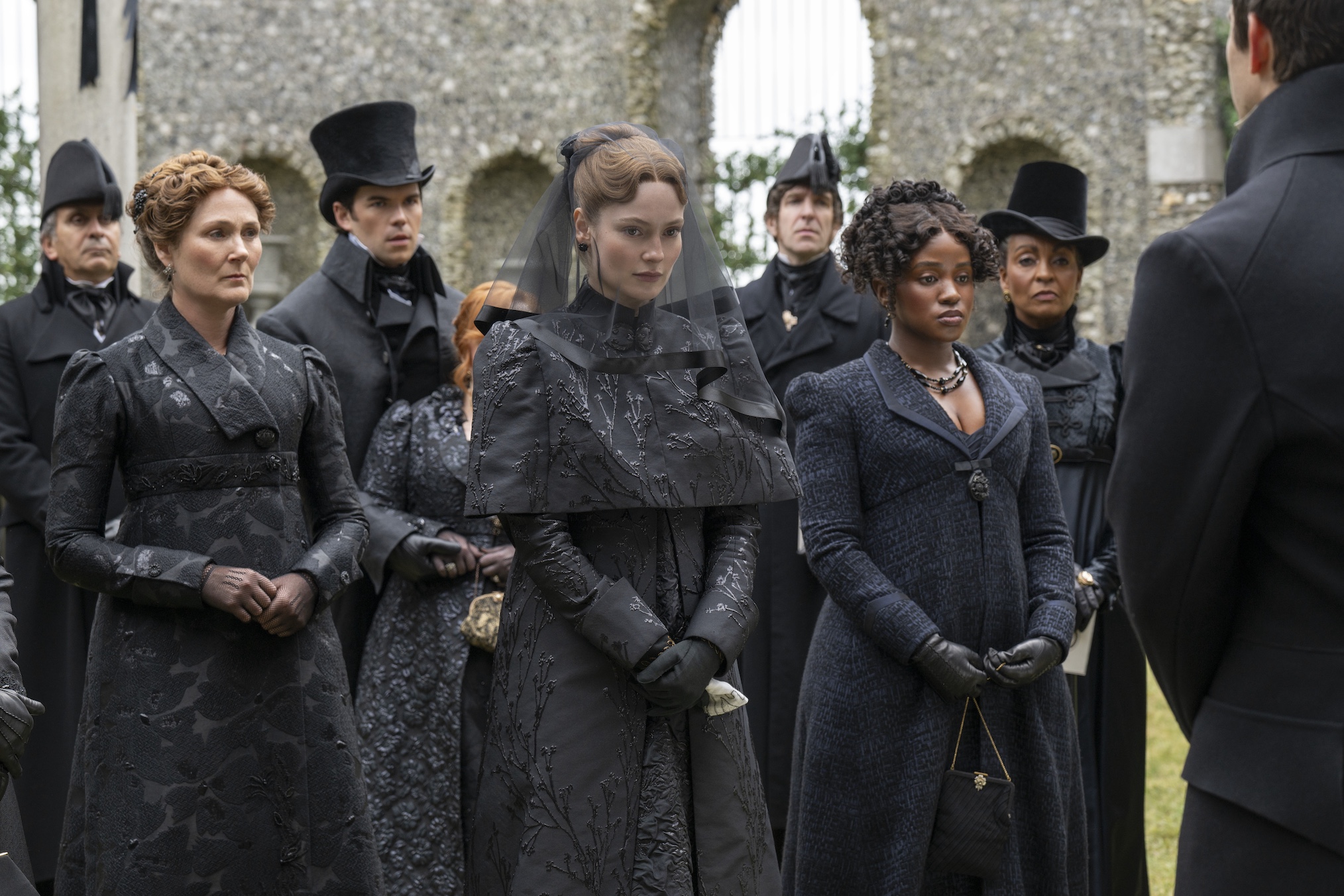 Ruth Gemmell as Lady Violet Bridgerton, Luke Newton as Colin Bridgerton, Hannah Dodd as Francesca Bridgerton, Masali Baduza as Michaela Stirling, Adjoa Andoh as Lady Danbury in episode 407 of Bridgerton.