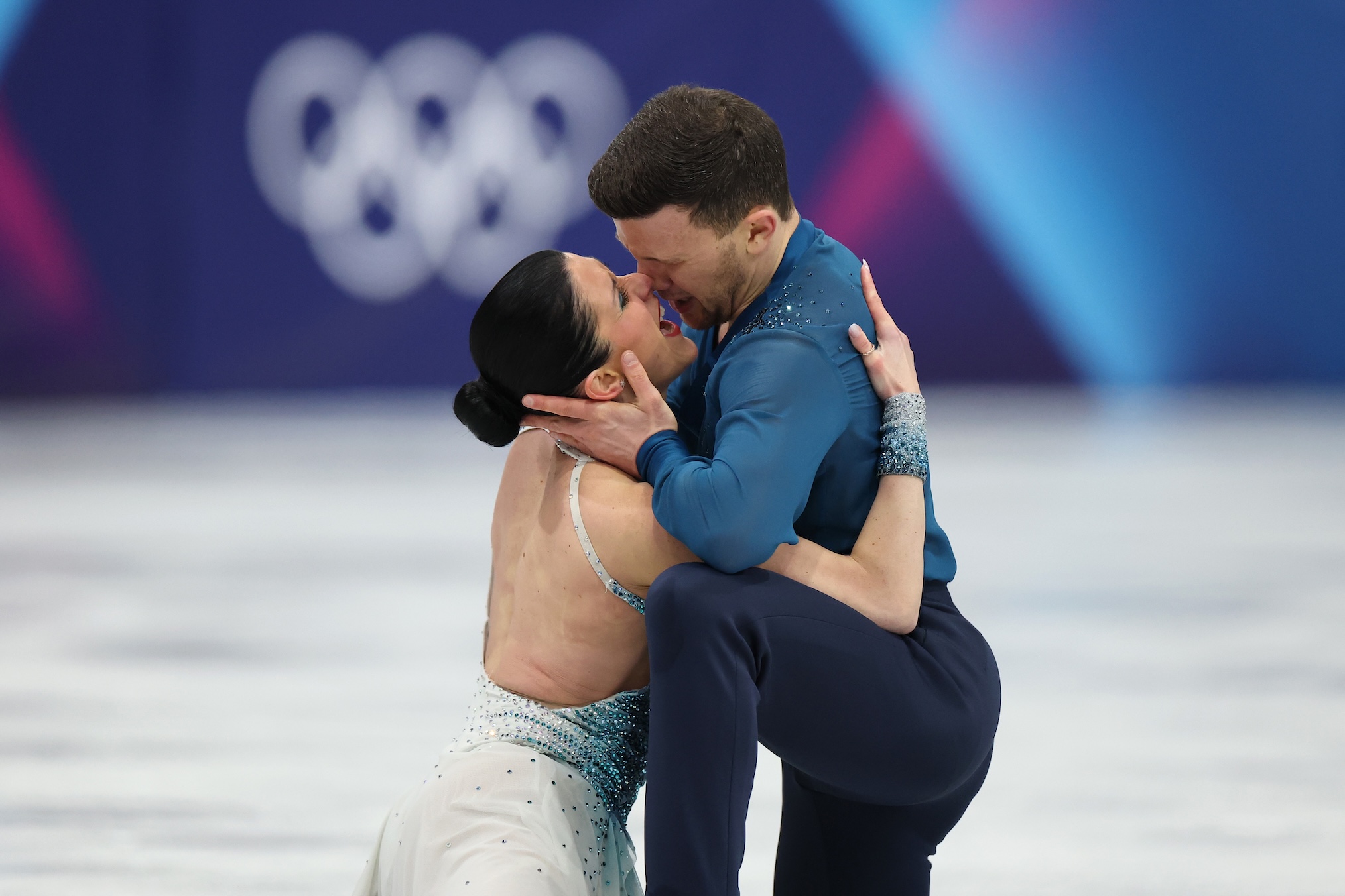 Charlene Guignard and partner Marco Fabbri of Team Italy share a kiss after competing in Ice Dance - Free Dance Team Event on day one of the Milano Cortina 2026 Winter Olympic games at Milano Ice Skating Arena on February 07, 2026 in Milan, Italy.